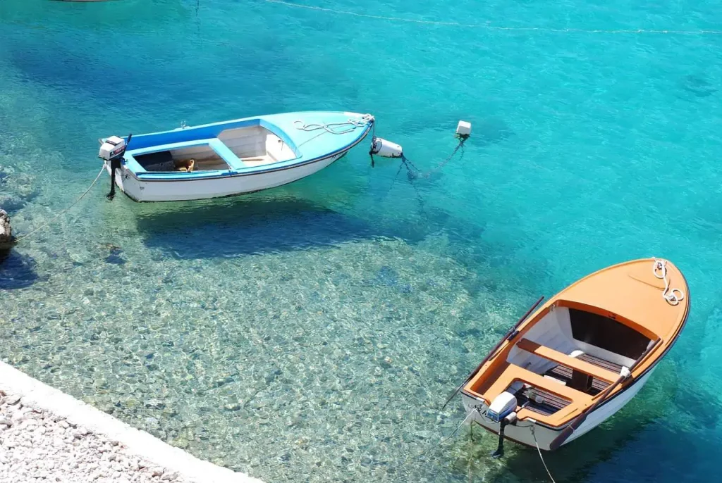 Boats On Crystal Clear Water