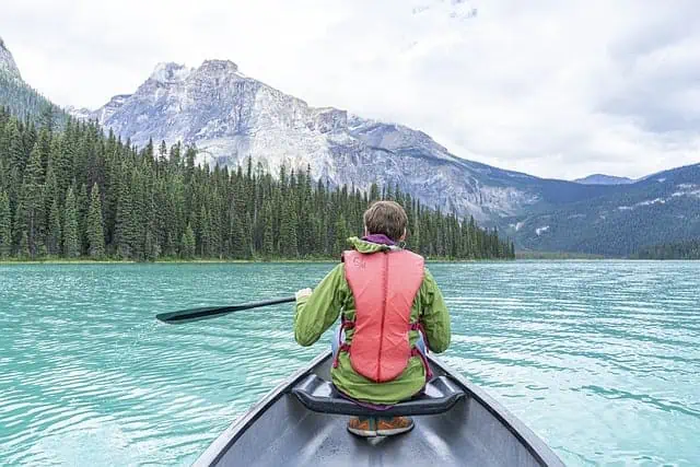 A man canoe at lake - Differences Between Kayaks And Canoes A man canoe at lake - Differences Between Kayaks And Canoes